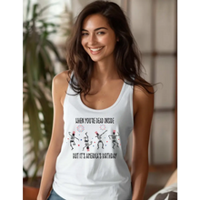 Load image into Gallery viewer, Model wearing a white racerback tank top with a design of dancing skeletons with fireworks.
