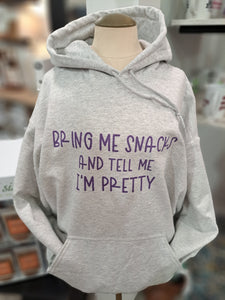 Ash Gray Hoodie with 'Bring me snacks and tell me I'm pretty' printed on it in purple
