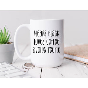 Wears black Coffee Mug BLNDesigns